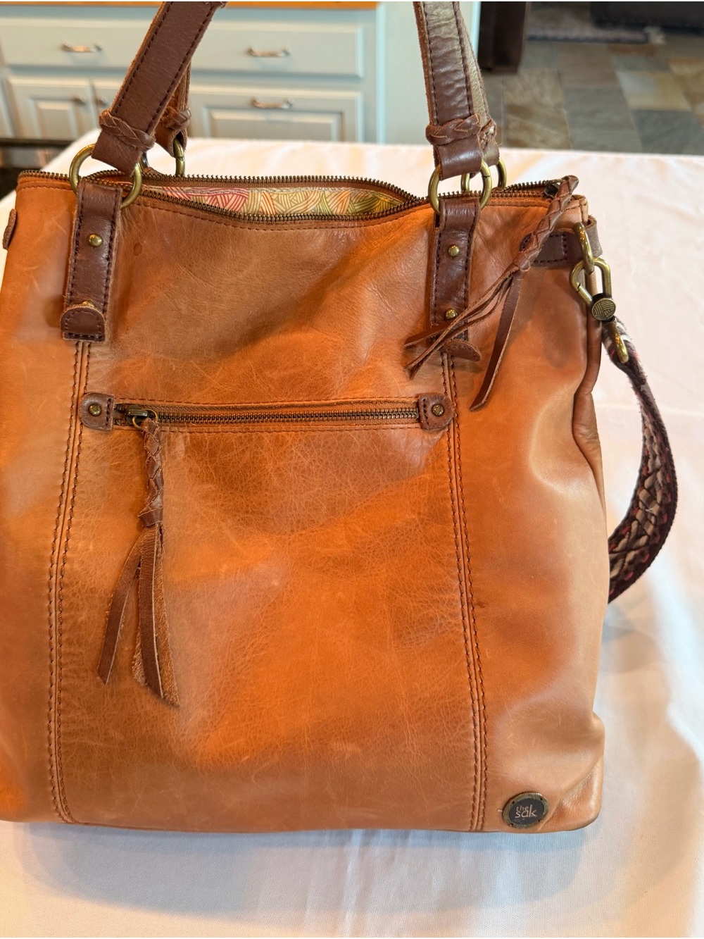 The Sak Ashland Cognac Leather Crossbody Large Shoulder Bag with Guitar Strap - Picture 9 of 9